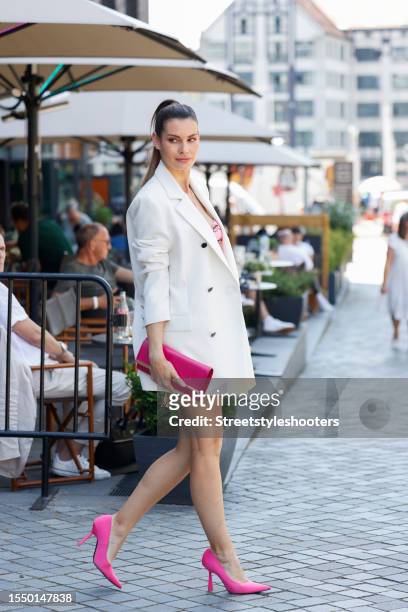 German actress Rebecca Kunikowski, wearing a white skirt by Marcel ostertag, a rose colored top by Calzedonia, a jacket by Marcel ostertag, jewelrey...