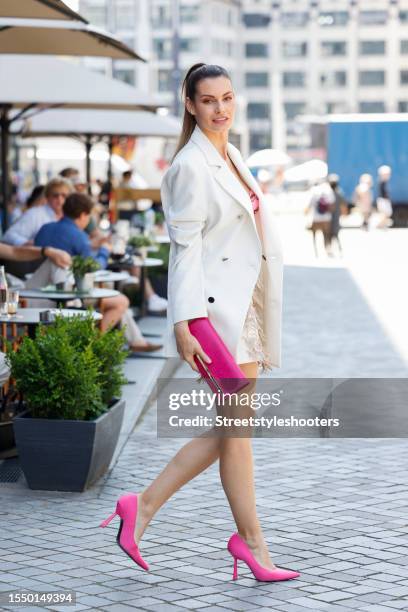 German actress Rebecca Kunikowski, wearing a white skirt by Marcel ostertag, a rose colored top by Calzedonia, a jacket by Marcel ostertag, jewelrey...