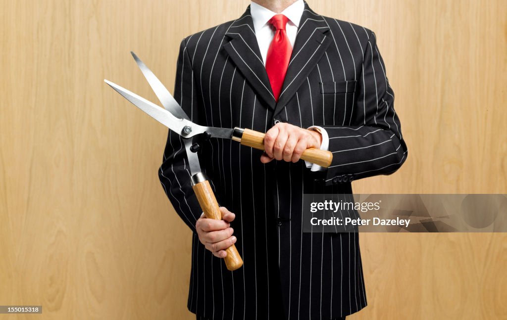 Business man cost cutting