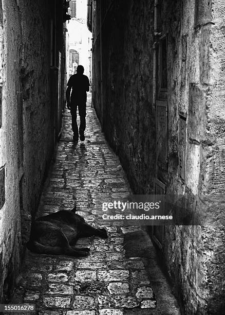 alley. black and white - black alley stock pictures, royalty-free photos & images