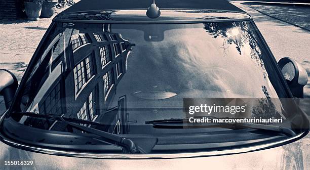 typically dutch architecture reflected in a car windscreen - toned image 個照片及圖片檔