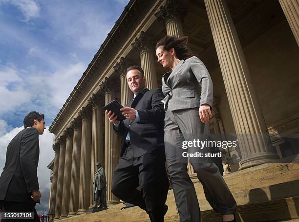 lawyers at courthouse - civil servant stock pictures, royalty-free photos & images