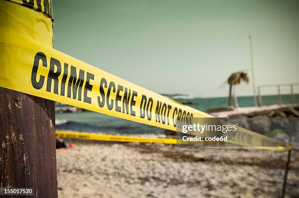 crime scene at the beach - murder beach stock pictures, royalty-free photos & images