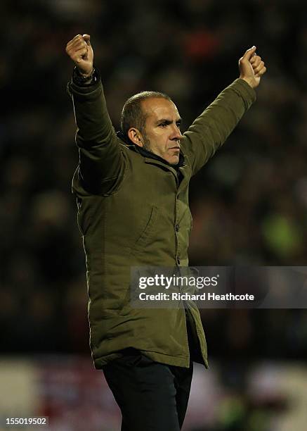 Paolo Di Canio, manager of Swindon Town celebrates his team's first goal during the Capital One Cup Fourth Round match between Swindon Town and Aston...