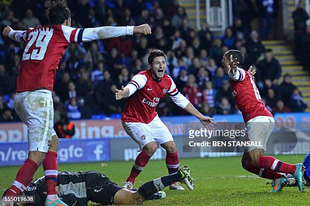 Arsenal's English striker Theo Walcott celebrates scoring Arsenal's sixth goal during extra time in the English League Cup Fourth Round football...