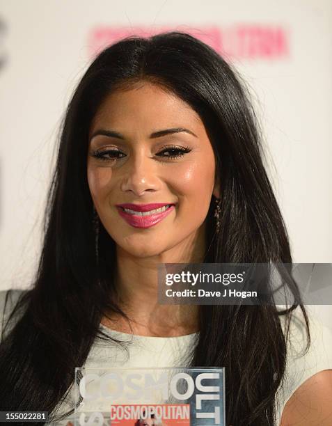 Nicole Scherzinger, Ultimate Fun Fearless Female, poses at the winners boards at the Cosmopolitan Ultimate Woman of the Year awards at Victoria &...