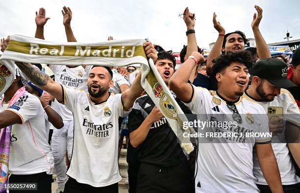 Real Madrid's supporters cheers during the friendly football match between Real Madrid and AC Milan at the Rose Bowl in Pasadena, California, on July...