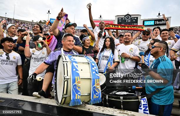 Real Madrid's supporters cheers during the friendly football match between Real Madrid and AC Milan at the Rose Bowl in Pasadena, California, on July...