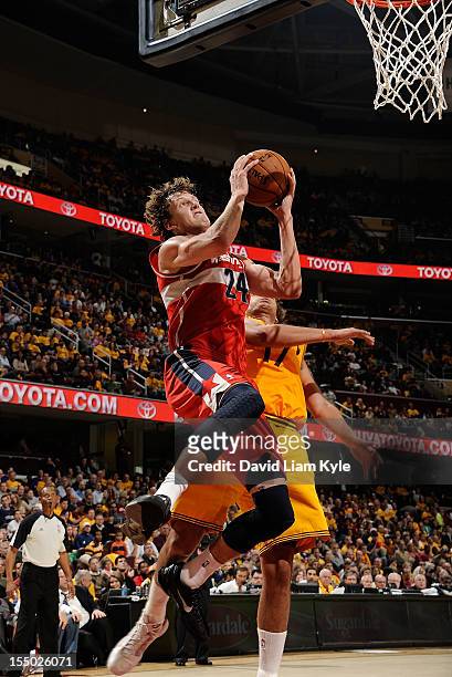 Jan Vesely of the Washington Wizards goes up for the basket against Anderson Varejao of the Cleveland Cavaliers at The Quicken Loans Arena on October...