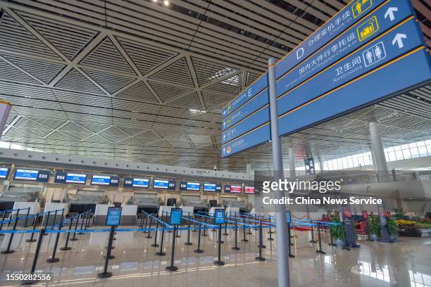 Outdoor electrical equipments are covered with plastic sheeting at Haikou Meilan International Airport on July 17, 2023 in Haikou, Hainan Province of...