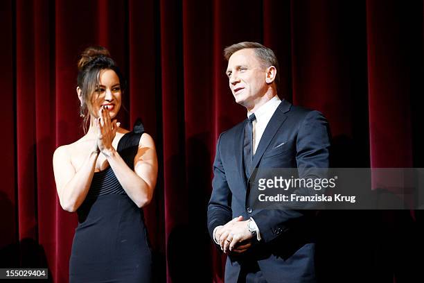 Berenice Marlohe and Daniel Craig attend the 'Skyfall' Germany Premiere at Theater am Potsdamer Platz on October 30, 2012 in Berlin, Germany.