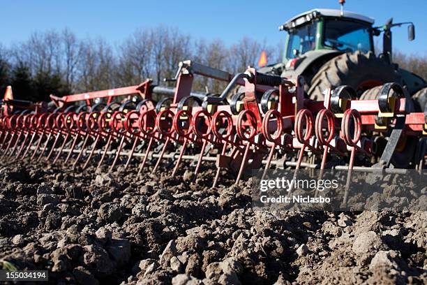 harrow and tractor - harrow agricultural equipment stock pictures, royalty-free photos & images