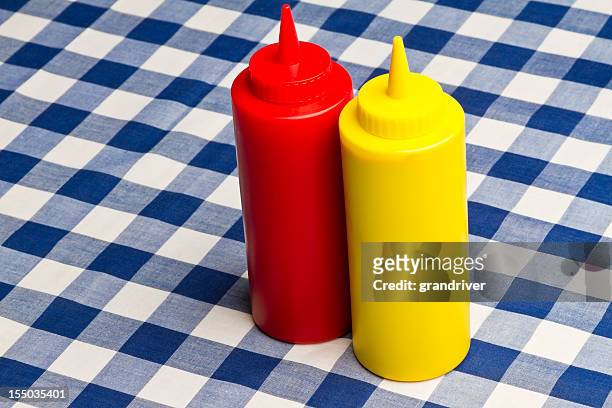 ketchup and mustard bottles - mustard stock pictures, royalty-free photos & images
