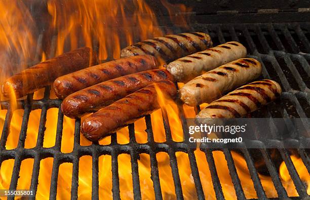 brats and hot dogs - sausage patty stock pictures, royalty-free photos & images