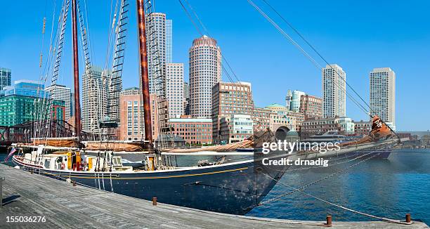 sailboat and boston skyline under clear blue sky - boston harbour stock pictures, royalty-free photos & images