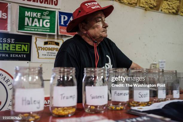 July 22: Carl McKnight sits behind a public mock election for GOP presidential candidates at the Boone Republican Party booth at the Boone County...