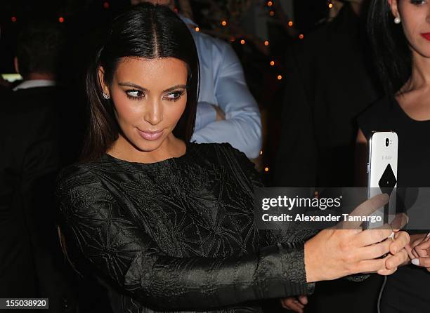 Kim Kardashian enjoys the interactive experience at Samsung Galaxy Note II Presents: The Next Big Thing & The Ring at Soho Beach House Miami on...