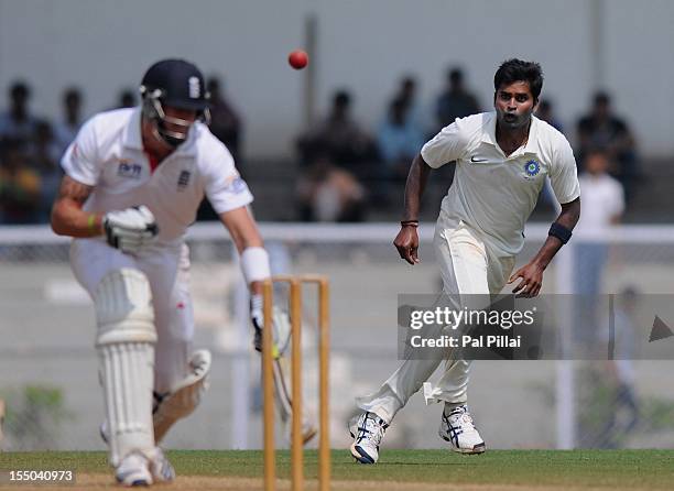 Vinay Kumar of India 'A' throws the ball towards the stumps as Kevin Pietersen of England bats during the second day of the opening tour match...