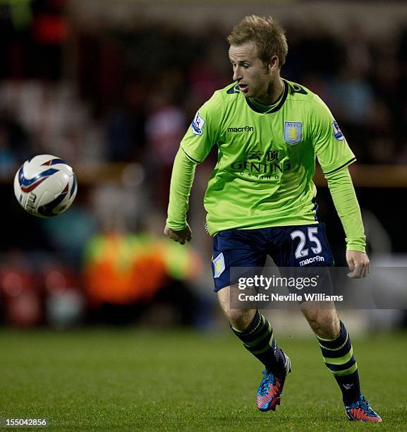 Barry Bannan of Aston Villa controls the ball during the Capital One Cup Fourth Round match between Swindon Town and Aston Villa at the County Ground...