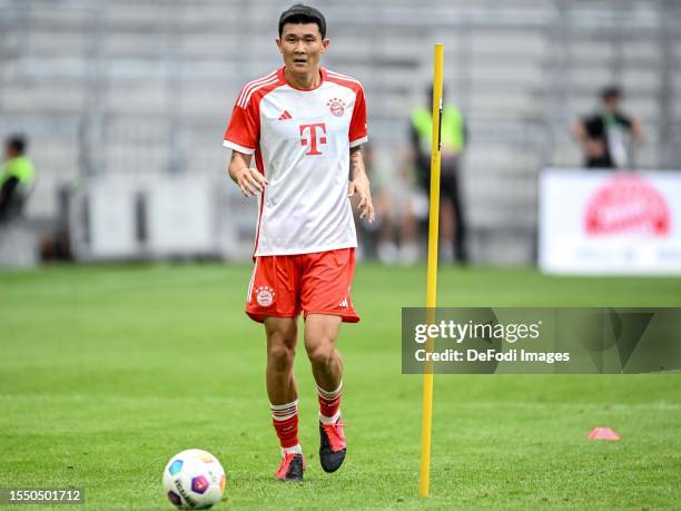 Minjae Kim of Bayern Muenchen controls the Ball during the team presentation of FC Bayern München at Allianz Arena on July 23, 2023 in Munich,...