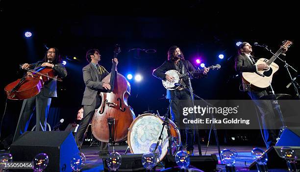 Joe Kwon, Bob Crawford, Scott Avett and Seth Avett of The Avett Brothers perform at the 60th annual BMI Country awards at BMI on October 30, 2012 in...