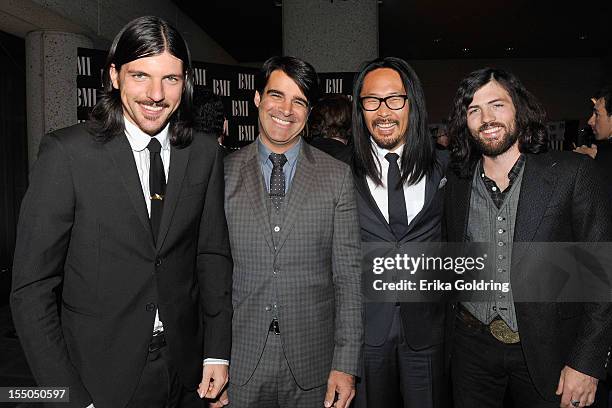 Seth Avett, Bob Crawford, Joe Kwon and Scott Avett of The Avett Brothers attend the 60th annual BMI Country awards at BMI on October 30, 2012 in...