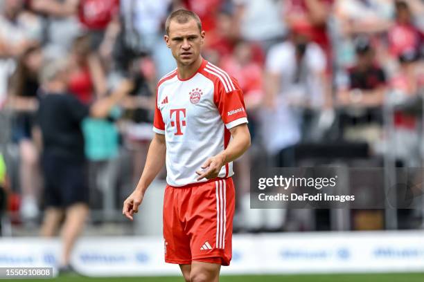 Joshua Kimmich of Bayern Muenchen gestures during the team presentation of FC Bayern München at Allianz Arena on July 23, 2023 in Munich, Germany.