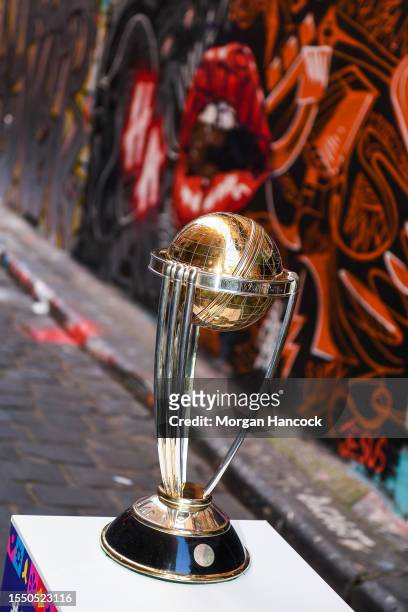 The ICC Men's Cricket World Cup trophy can be seen at Hosier Lane during an ICC World Cup Media Opportunity in Melbourne on July 17, 2023 in...