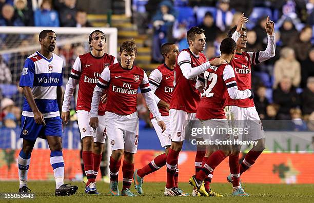 Marouane Chamakh of Arsenal celebrates after scoring their fifth goal during the Capital One Cup Fourth Round match between Reading and Arsenal at...