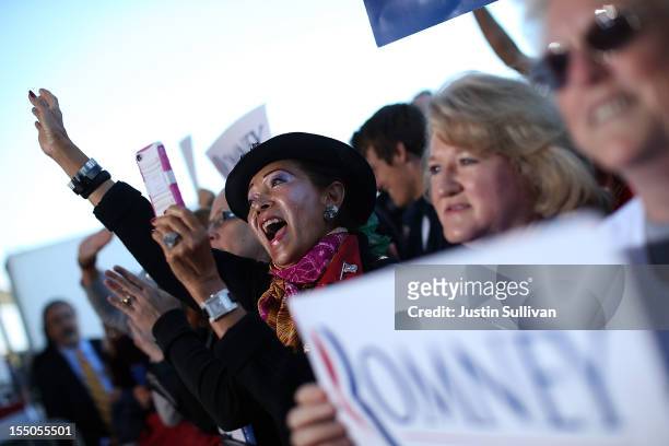 Supporters of Republican presidential candidate, former Massachusetts Gov. Mitt Romney cheer during campaign rally at Tampa International Airport on...