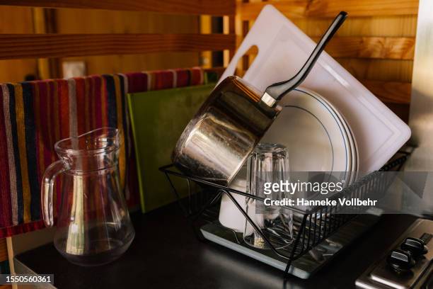 drying dishes on holiday - hanneke vollbehr bildbanksfoton och bilder
