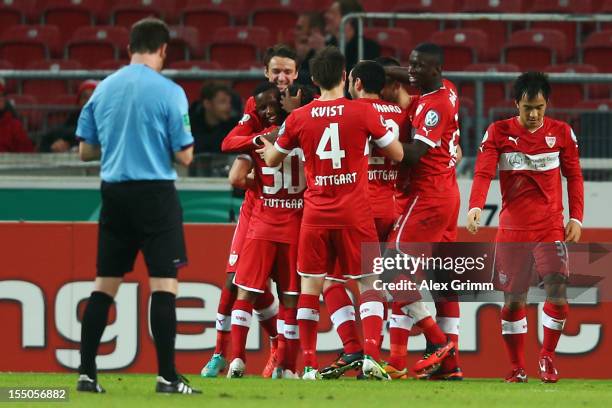 Tamasz Hajnal celebrates his team's third goal with team mates during the second round match of the DFB Cup between VfB Stuttgart and FC St.Pauli at...