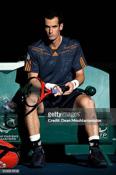 Andy Murray of Great Britain looks on prior to his match against Paul-Henri Mathieu of France during day 3 of the BNP Paribas Masters at Palais...