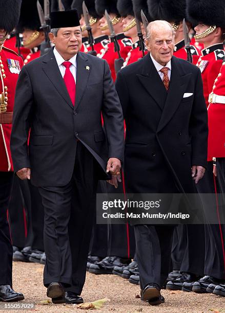 Susilo Bambang Yudhoyono, President of the Republic of Indonesia and Prince Philip, Duke of Edinburgh inspect a guard of honour during the ceremonial...