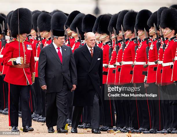 Susilo Bambang Yudhoyono, President of the Republic of Indonesia and Prince Philip, Duke of Edinburgh inspect a guard of honour during the ceremonial...
