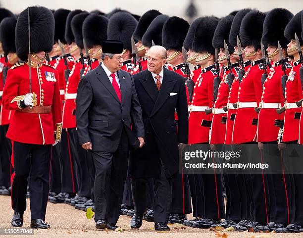 Susilo Bambang Yudhoyono, President of the Republic of Indonesia and Prince Philip, Duke of Edinburgh inspect a guard of honour during the ceremonial...