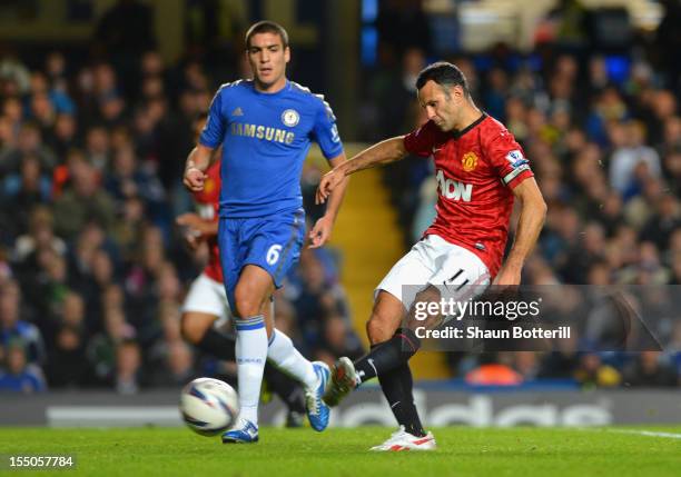 Ryan Giggs of Manchester United scores the opening goal during the Capital One Cup Fourth Round match between Chelsea and Manchester United at...