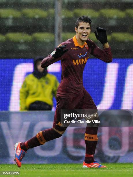 Erik Lamela of AS Roma celebrates scoring the first goal during the Serie A match between Parma FC and AS Roma at Stadio Ennio Tardini on October 31,...