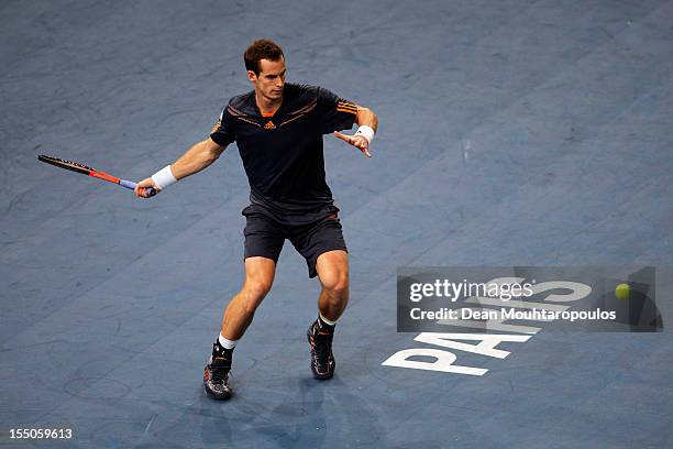 Andy Murray of Great Britain in action against Paul Henri Mathieu of France during day 3 of the BNP Paribas Masters at Palais Omnisports de Bercy on...