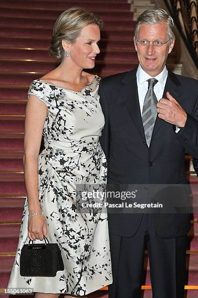 Princess Mathilde and Prince Philippe of Belgium pose as they arrive at Theatre des Champs-Elysees to attend the 'Liege A Paris' concert on October...
