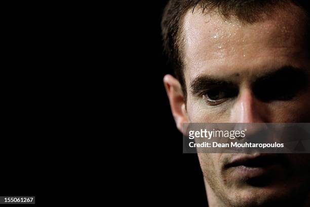 Andy Murray of Great Britain speaks to the media after victory against Paul Henri Mathieu of France during day 3 of the BNP Paribas Masters at Palais...