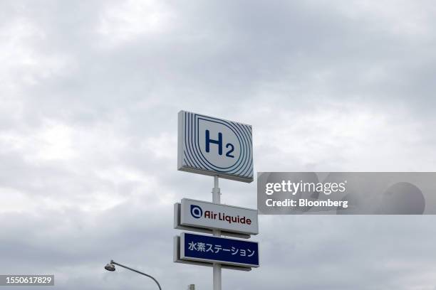 Signage at an Air Liquide hydrogen filling station in Kobe, Japan, on Thursday, July 13, 2023. MK West Group, an upmarket taxi operator that runs a...