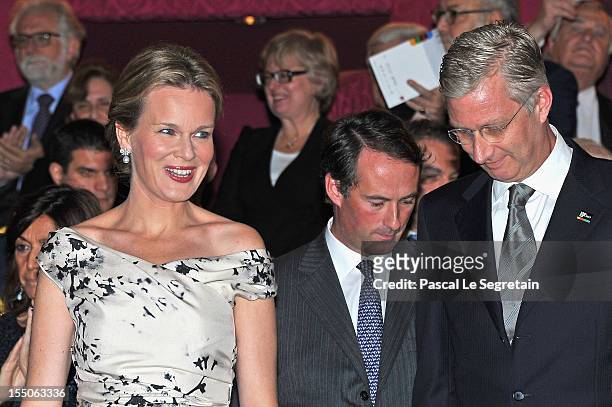 Princess Mathilde and Prince Philippe of Belgium take their seat after arriving at Theatre des Champs-Elysees to attend the 'Liege A Paris' Concert...