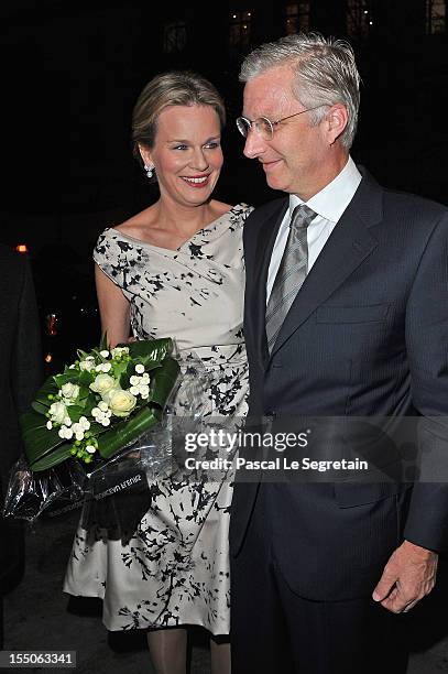 Princess Mathilde and Prince Philippe of Belgium arrive at Theatre des Champs-Elysees to attend the 'Liege A Paris' Concert performed by the Liege...