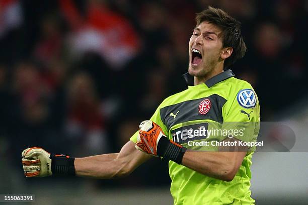 Fabian Gieferof Duesseldorf celebrates the 1-0 victory after extra time the DFB Cup second round match between Fortuna Duesseldorf and Borussia...