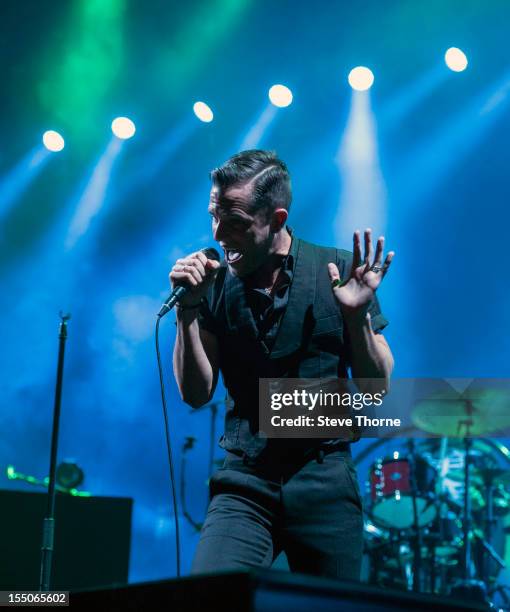 Brandon Flowers of The Killers performs on stage at LG Arena on October 31, 2012 in Birmingham, United Kingdom.