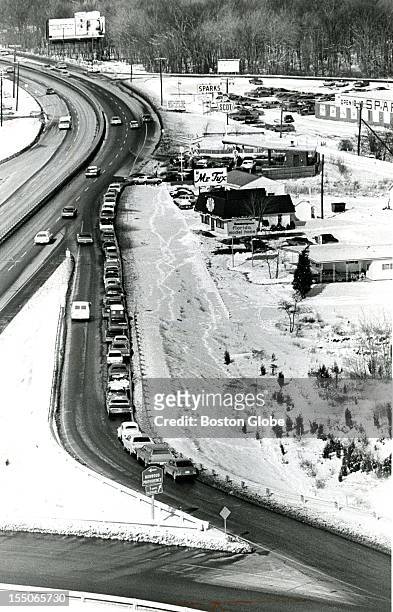 Scot gas station has about 50 cars lined up for gas on Route 1 in Norwood, February 9, 1974.
