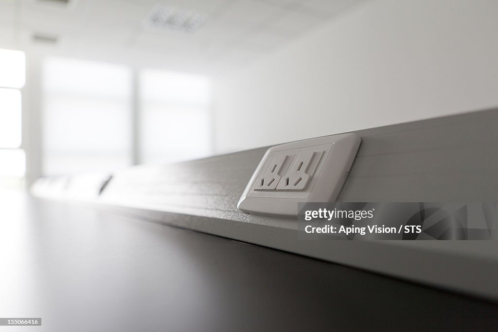 Electrical socket outlet on an office table