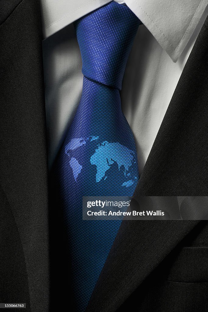 Close up of world map on a businessman's tie