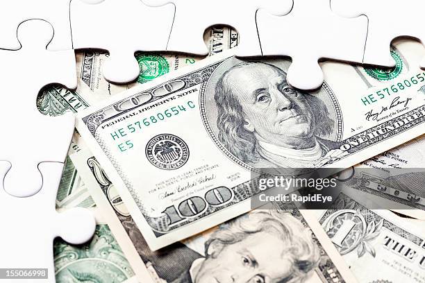 gap in incomplete jigsaw reveals stash of us dollars - hiding money stock pictures, royalty-free photos & images